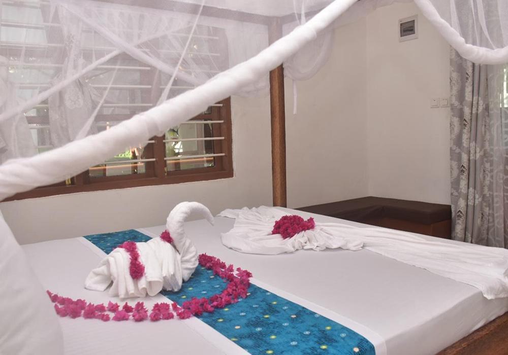 Utulivu Bungalow Нунгви Экстерьер фото