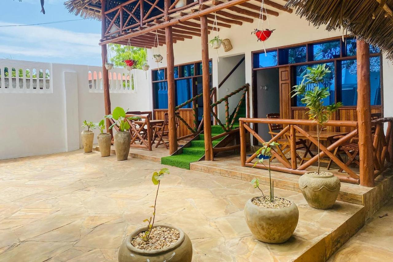 Utulivu Bungalow Нунгви Экстерьер фото