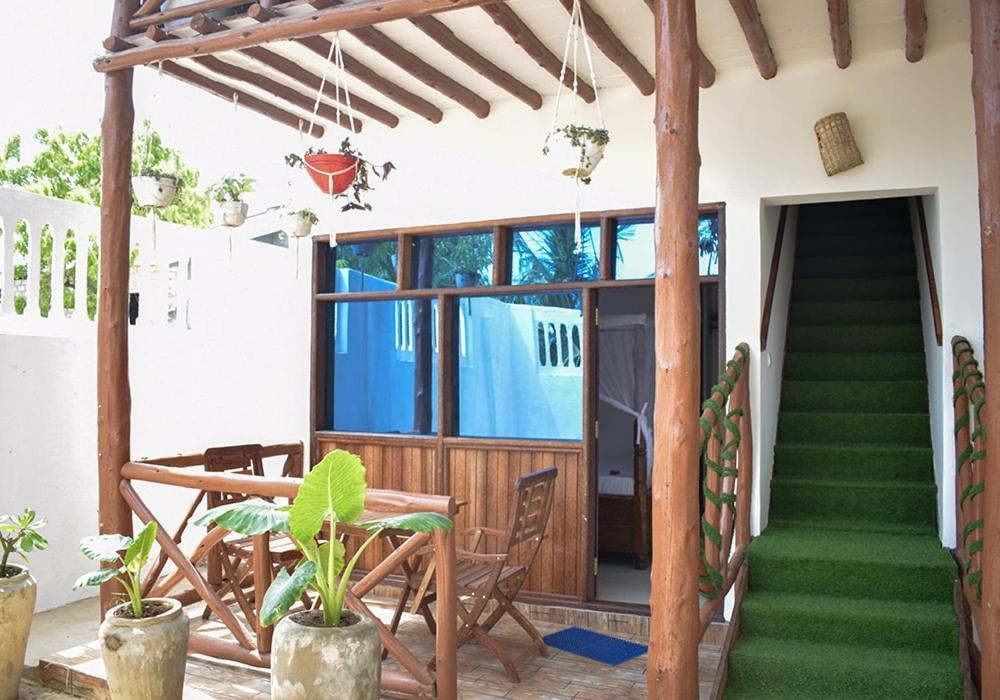 Utulivu Bungalow Нунгви Экстерьер фото