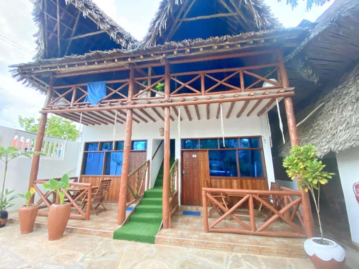 Utulivu Bungalow Нунгви Экстерьер фото