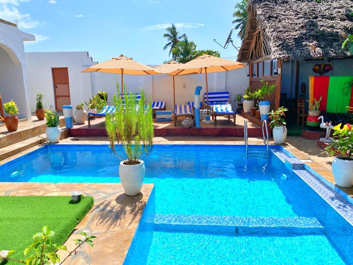 Utulivu Bungalow Нунгви Экстерьер фото