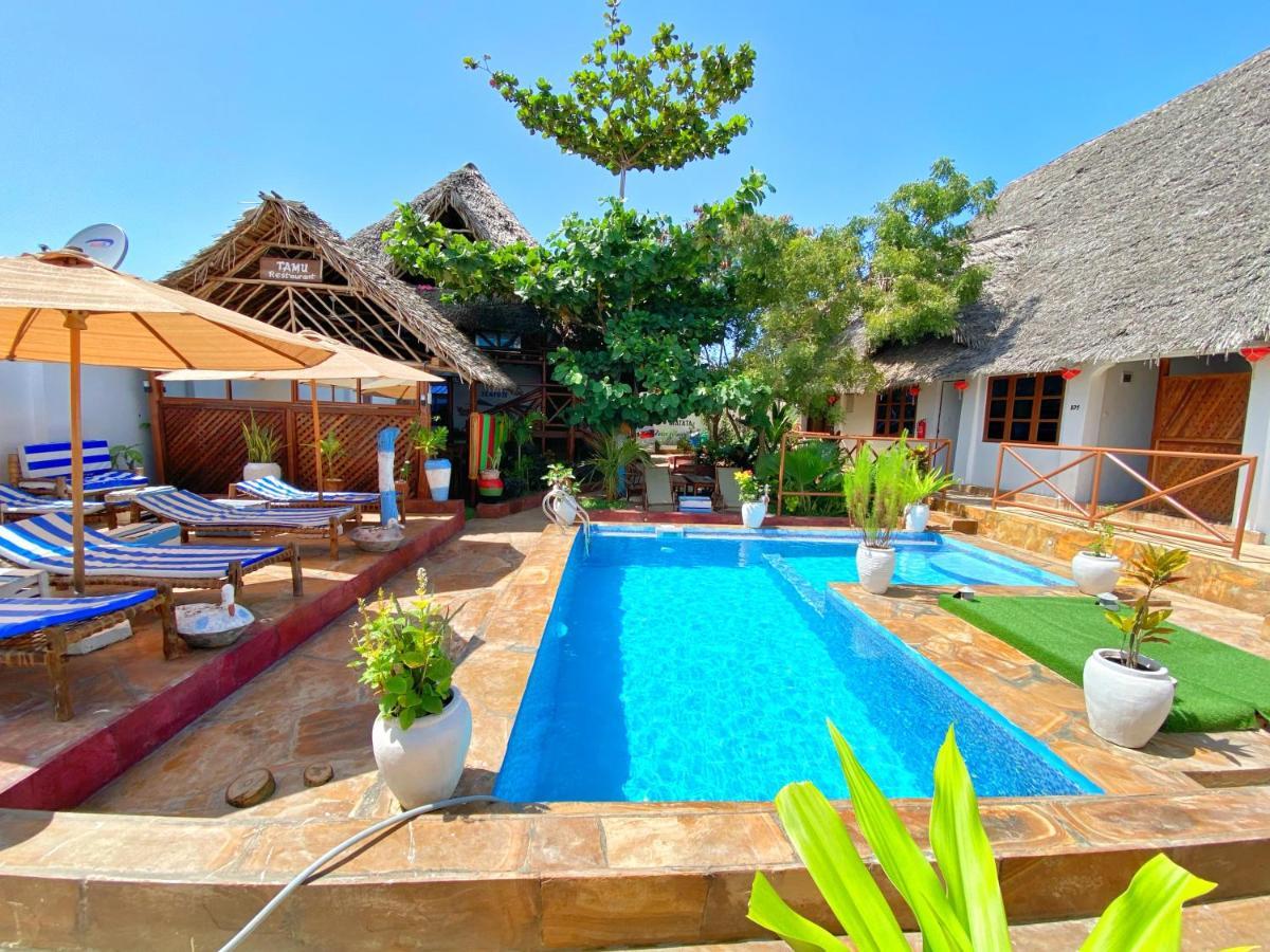 Utulivu Bungalow Нунгви Экстерьер фото