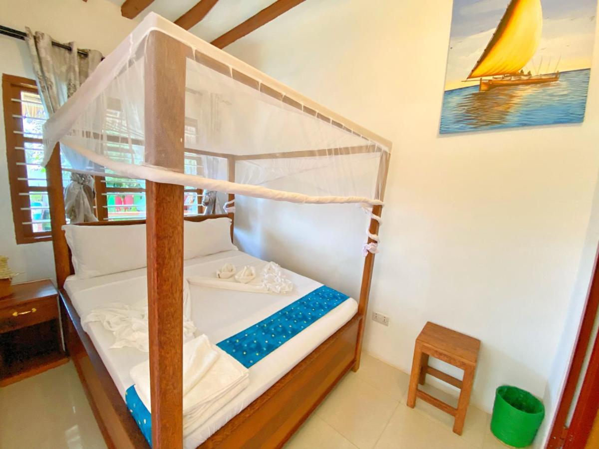 Utulivu Bungalow Нунгви Экстерьер фото