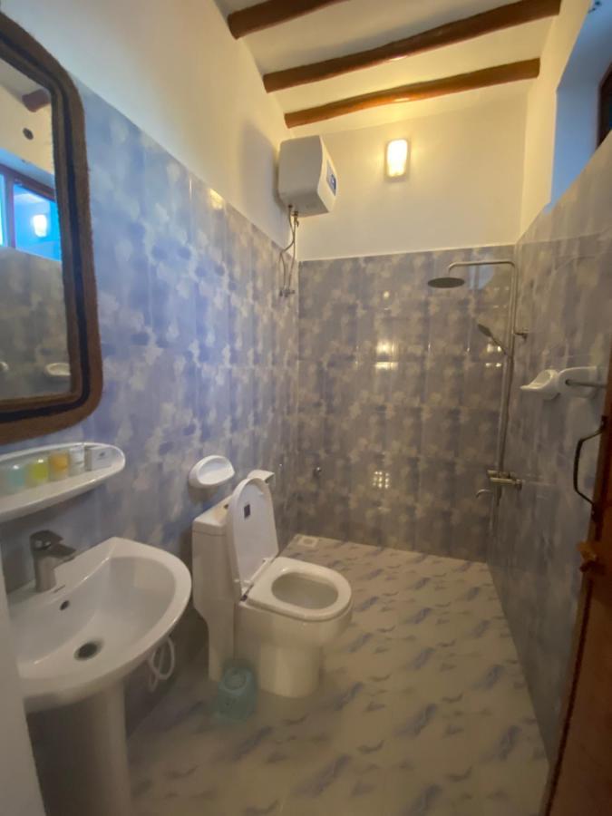 Utulivu Bungalow Нунгви Экстерьер фото