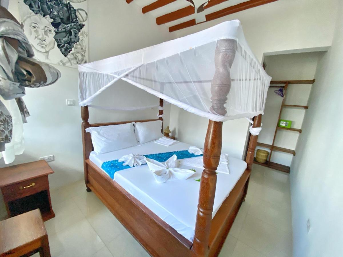 Utulivu Bungalow Нунгви Экстерьер фото