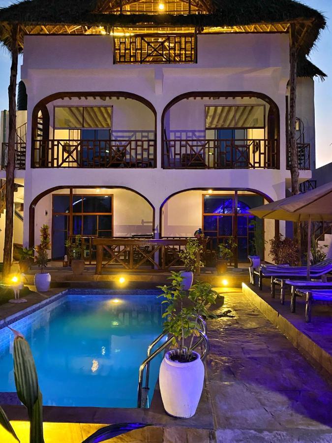 Utulivu Bungalow Нунгви Экстерьер фото