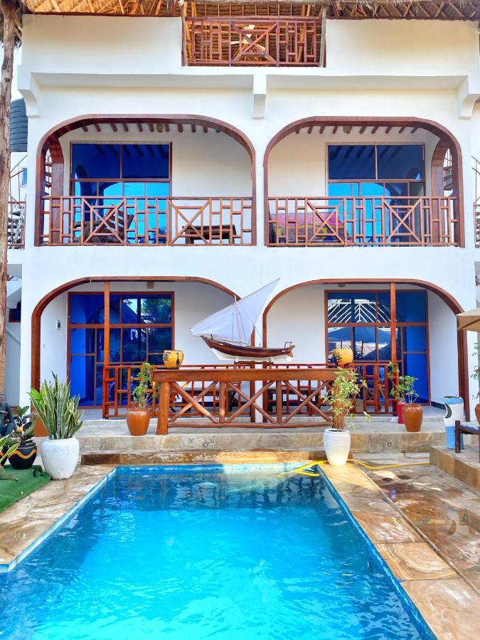 Utulivu Bungalow Нунгви Экстерьер фото