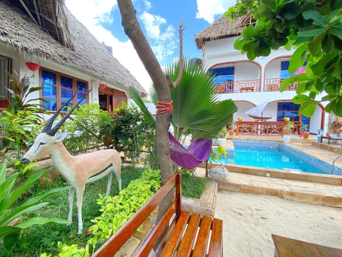 Utulivu Bungalow Нунгви Экстерьер фото