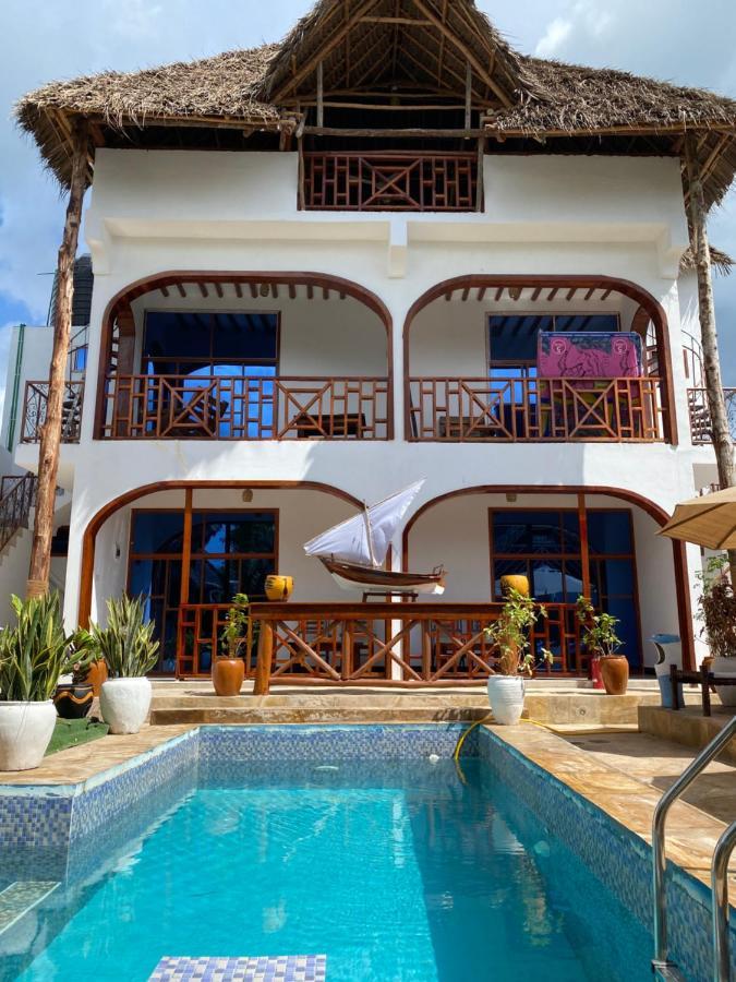 Utulivu Bungalow Нунгви Экстерьер фото