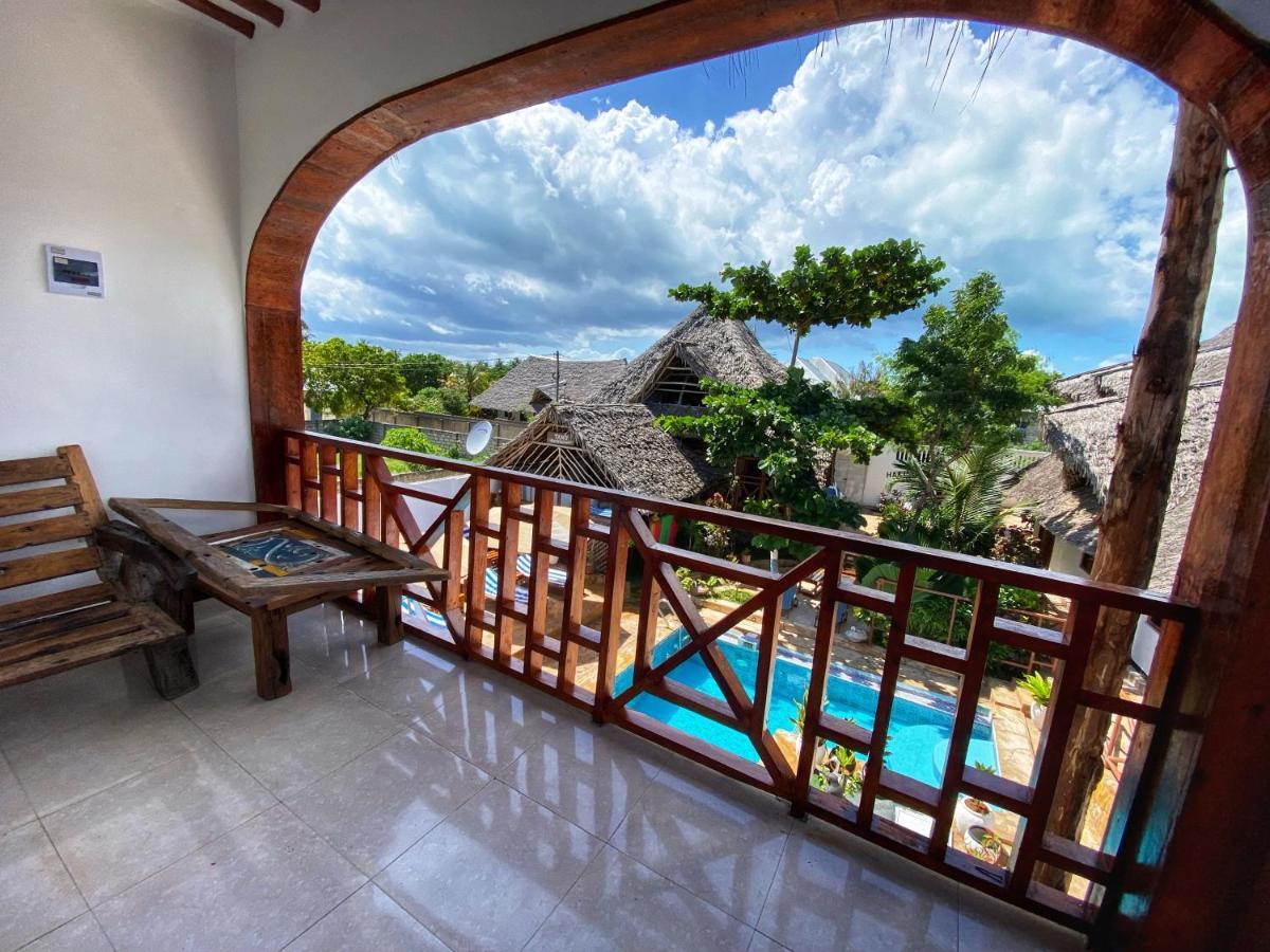 Utulivu Bungalow Нунгви Экстерьер фото
