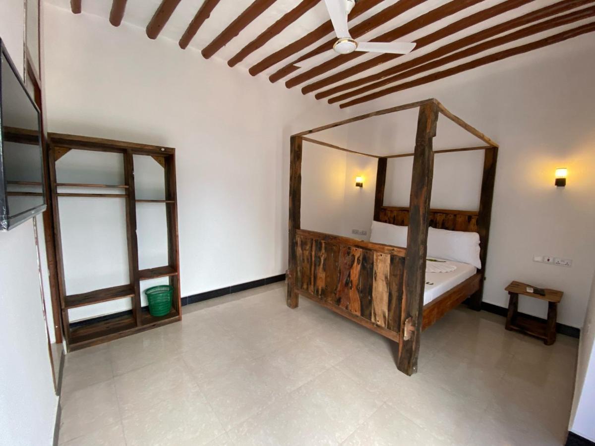 Utulivu Bungalow Нунгви Экстерьер фото