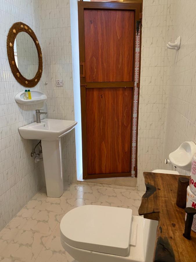 Utulivu Bungalow Нунгви Экстерьер фото