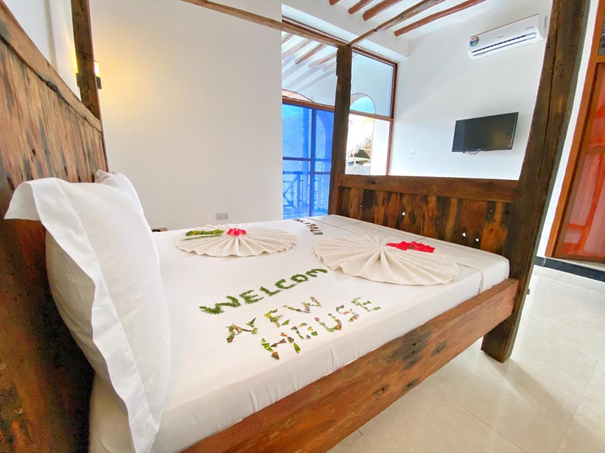 Utulivu Bungalow Нунгви Экстерьер фото