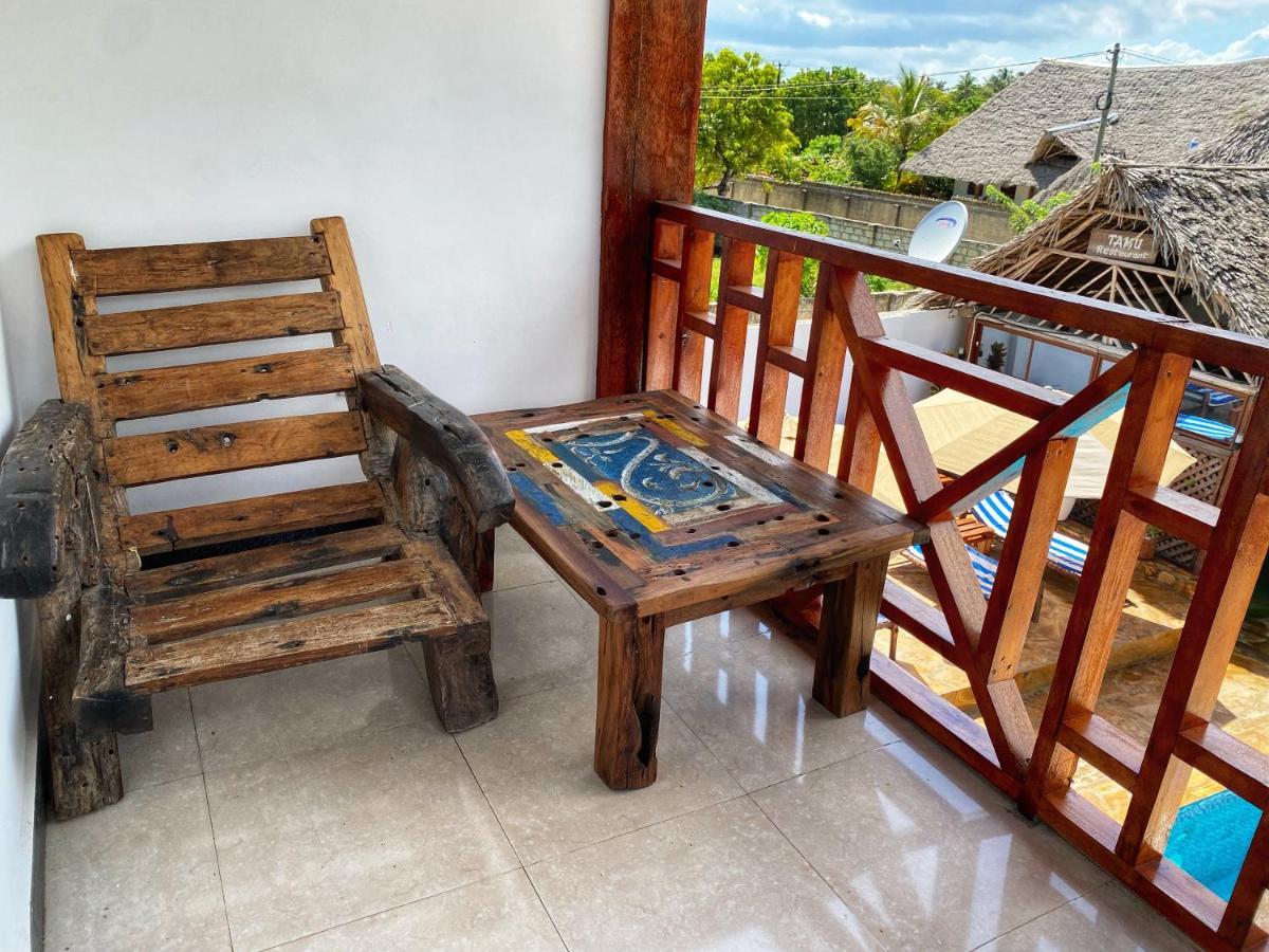 Utulivu Bungalow Нунгви Экстерьер фото