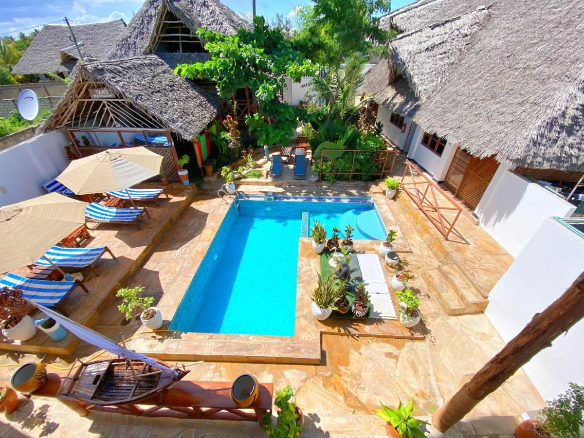 Utulivu Bungalow Нунгви Экстерьер фото
