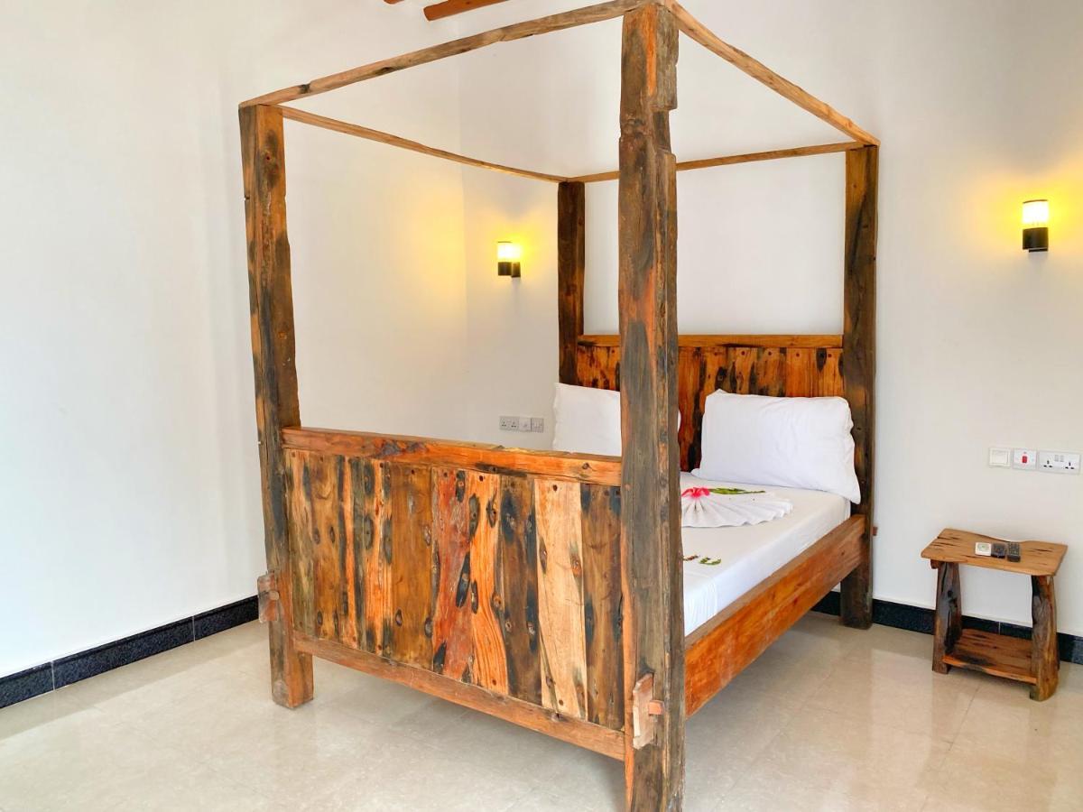 Utulivu Bungalow Нунгви Экстерьер фото