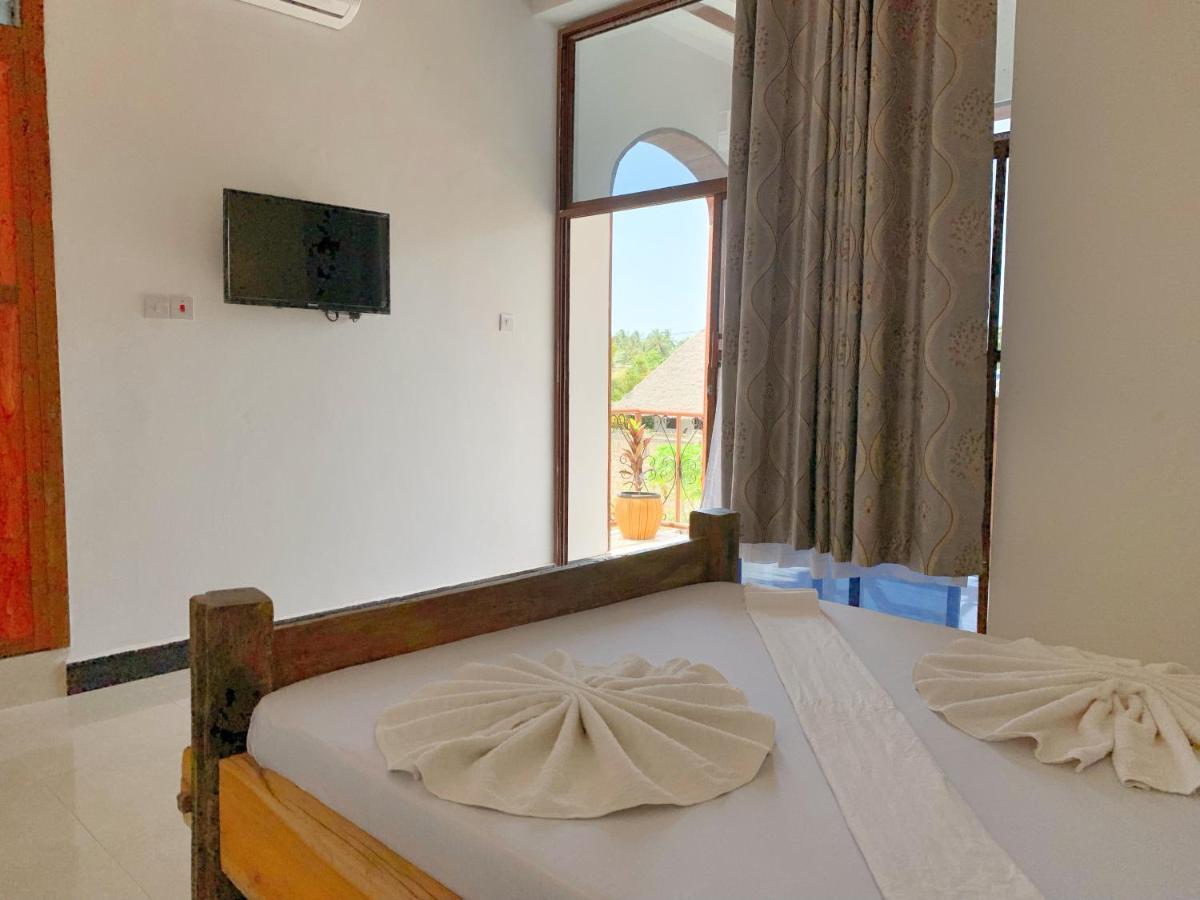 Utulivu Bungalow Нунгви Экстерьер фото