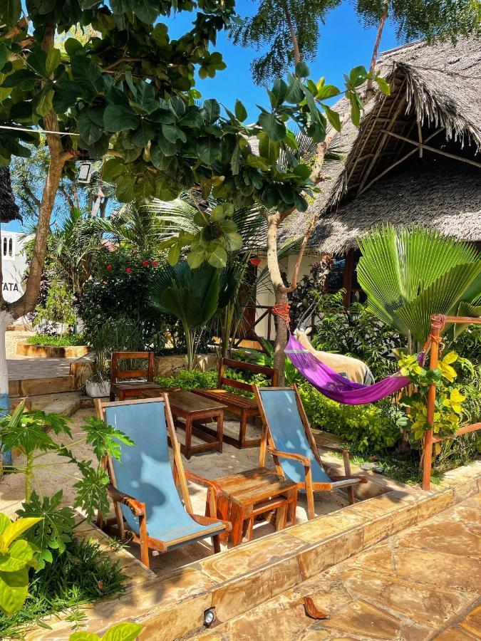 Utulivu Bungalow Нунгви Экстерьер фото